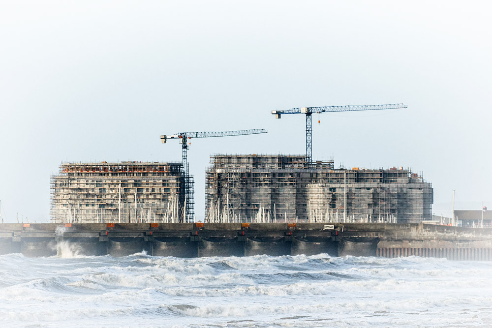 Brighton Marina with building construction in rear