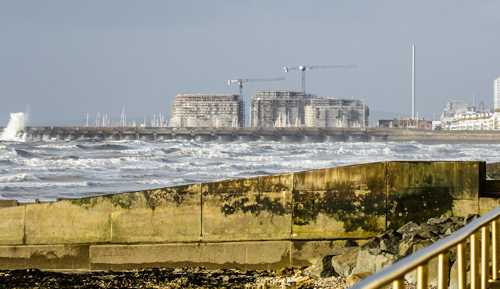Brighton Marina with building construction in rear